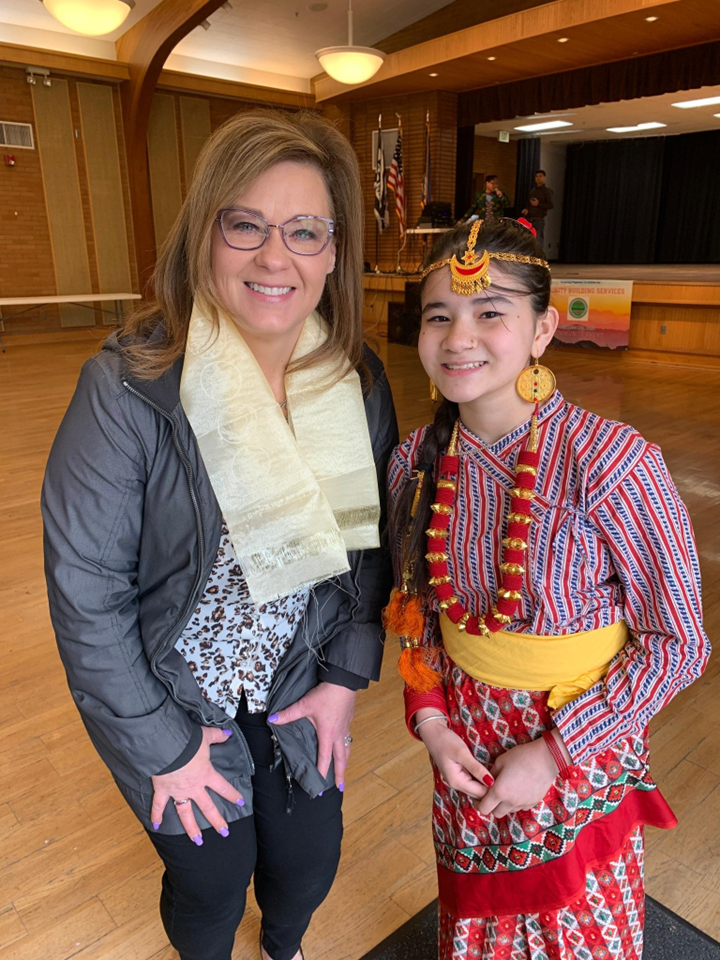 Mayor with Student in National Dress